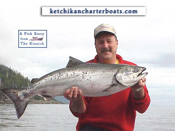 A Guy Holding A salmon